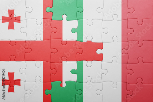 puzzle with the national flag of italy and georgia