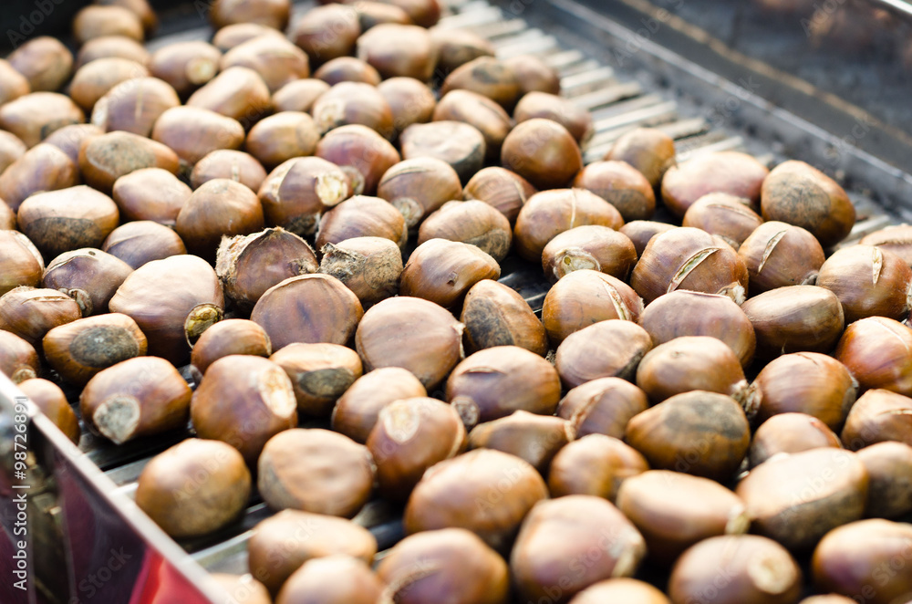Roasted Spanish chestnuts on farm market Roasted Spanish chestnuts on farm market