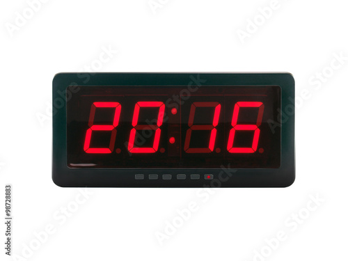close up red led light illumination numbers 2016 on black digital electric alarm clock face isolated on white background, time symbol concept for celebrating the New Year