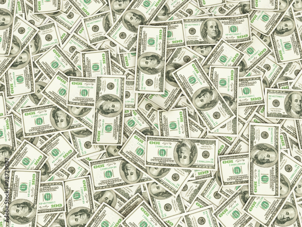 Hundreds of new Benjamin Franklin 100 dollar bills arranged rand Hundreds of new Benjamin Franklin 100 dollar bills arranged rand