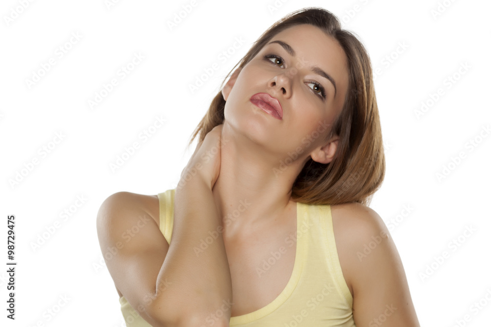 beautiful young woman has pain in the neck beautiful young woman has pain in the neck