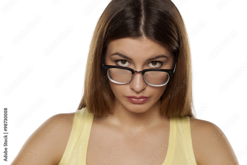 young beautiful woman with glasses on a white background young beautiful woman with glasses on a white background