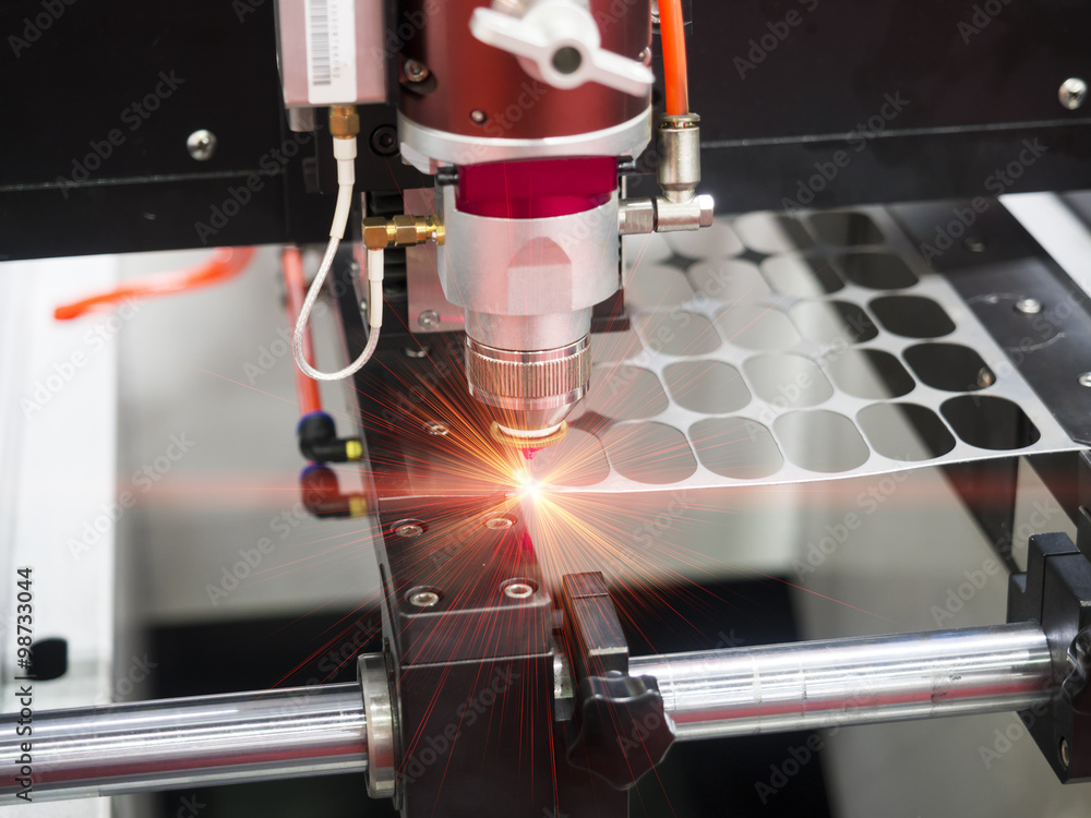 CNC laser cutting metal sheet Stock Photo | Adobe Stock