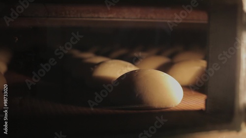 The bread on the conveyor oven. Bread bakery food factory 