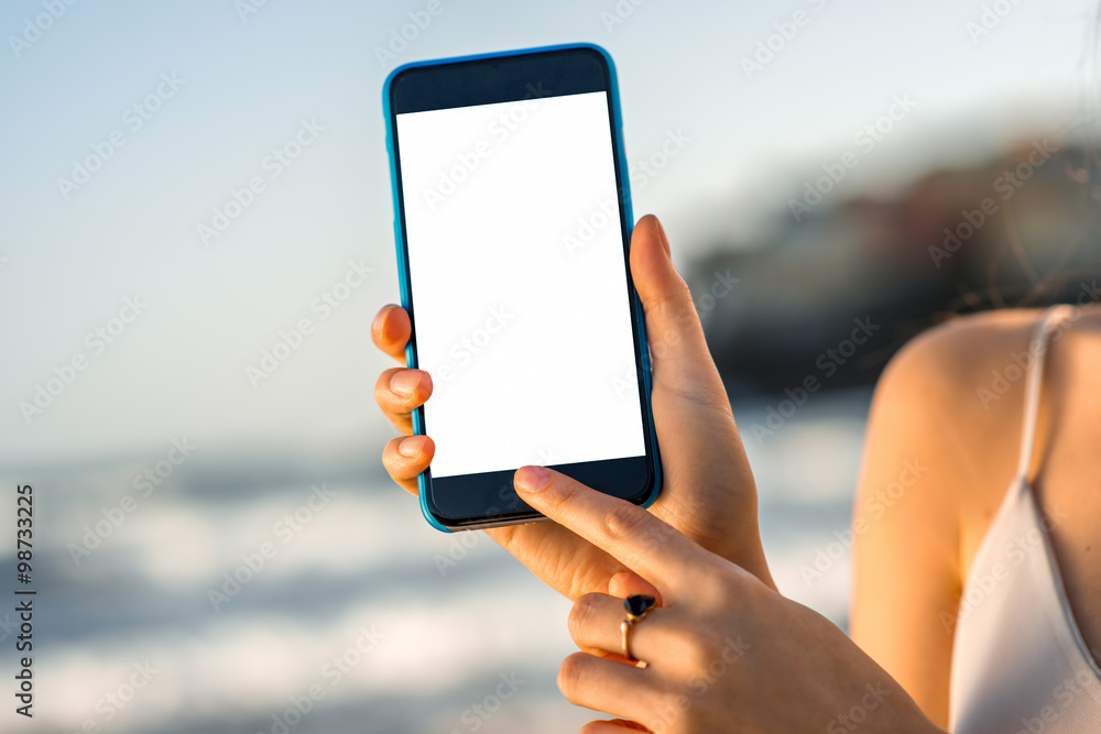Woman showing phone with white screen