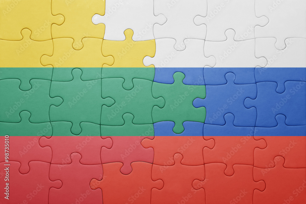 Fototapeta premium puzzle with the national flag of lithuania and russia