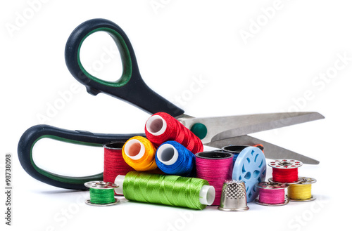 Composition with tailor threads isolated on white background