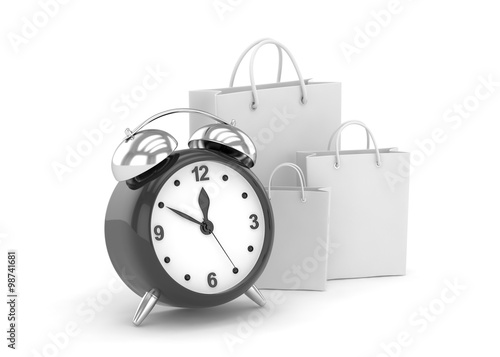 alarm clock and shopping bag (time to buy concept)