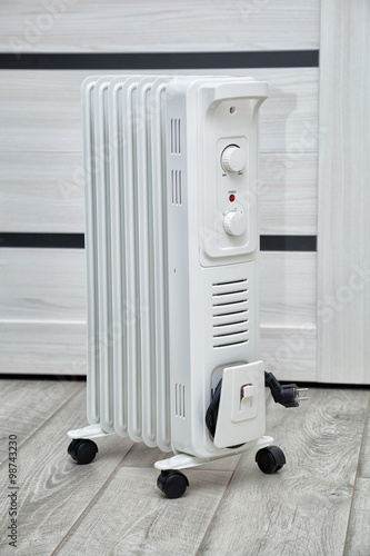 Oil electric radiator for heating in the apartment