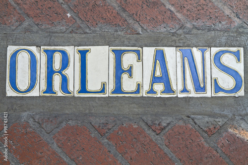 Sidewalk Orleans Street Sign