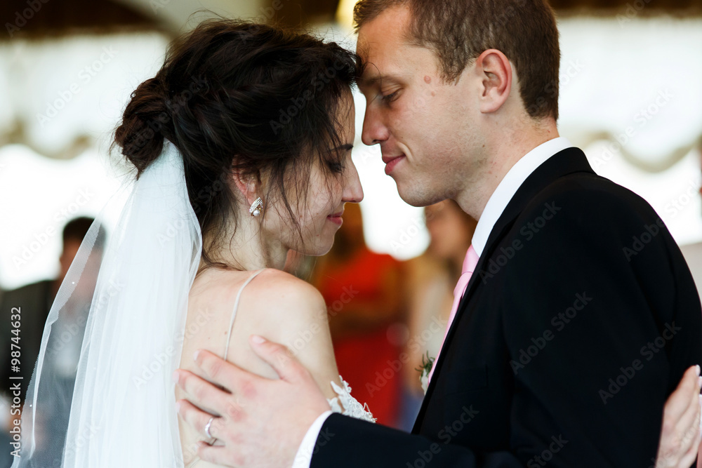 Romantic and sensual couple beautiful bride and groom dancing at Romantic and sensual couple beautiful bride and groom dancing at