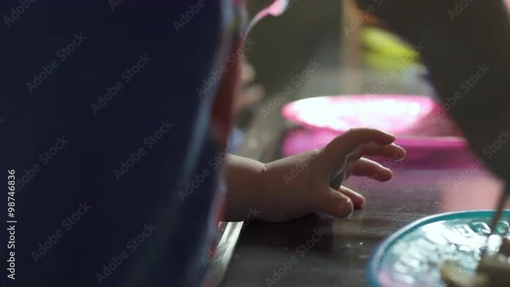 A child enjoys a snack A child enjoys a snack