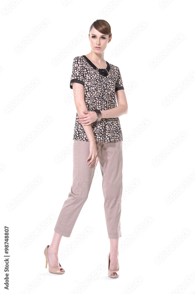 Full length of a beautiful young lady a white background Full length of a beautiful young lady a white background