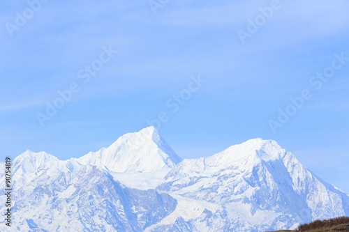 beautiful landscape of snow mountain under blue sky