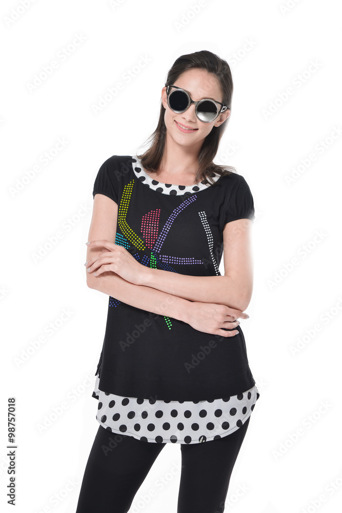 Beautiful fashion model in modern dress with sunglasses posing Beautiful fashion model in modern dress with sunglasses posing