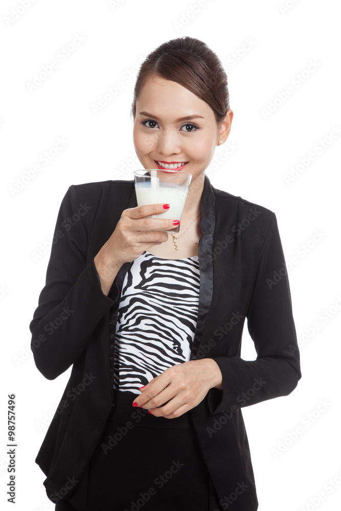Healthy Asian woman drinking a glass of milk Healthy Asian woman drinking a glass of milk