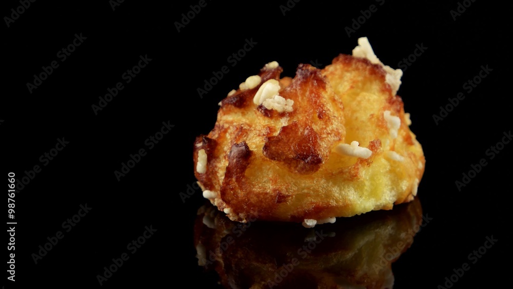 Choux French pastries (chouquette) on black background
Choux French pastries (chouquette) on black background