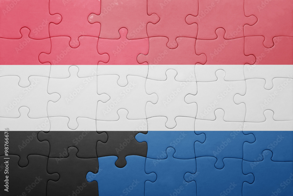 puzzle with the national flag of netherlands and yemen puzzle with the national flag of netherlands and yemen