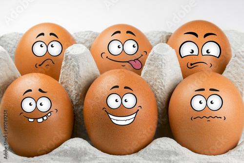 Eggs with faces and various expressions.