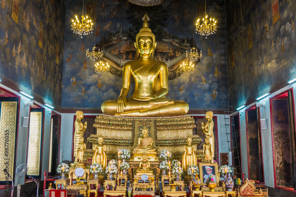 Golden buddha sitting at wat, Bangkok, Thailand