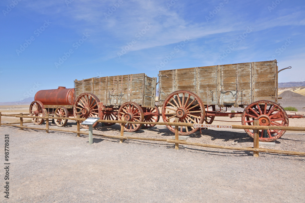 Old wagons and water tank at the Harmony Borax Works where 20 Mule Teams hauled the borax out of Death Valley