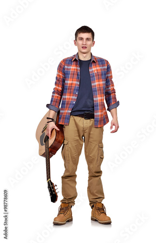 man holding acoustic guitar