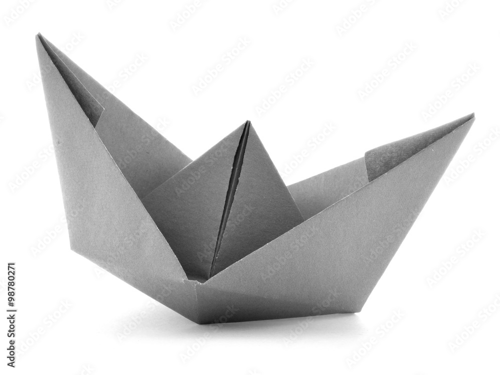 Black paper navigation origami sail boat isolated on white background Black paper navigation origami sail boat isolated on white background
