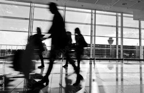 Passengers walking through in airport