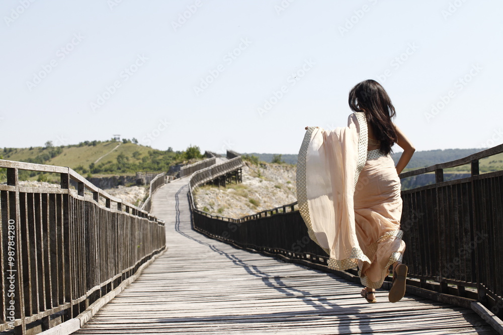 Lady at wood Bridge