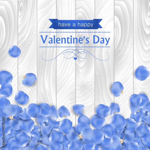 Valentines day card with rose blue petal on a white wooden background.