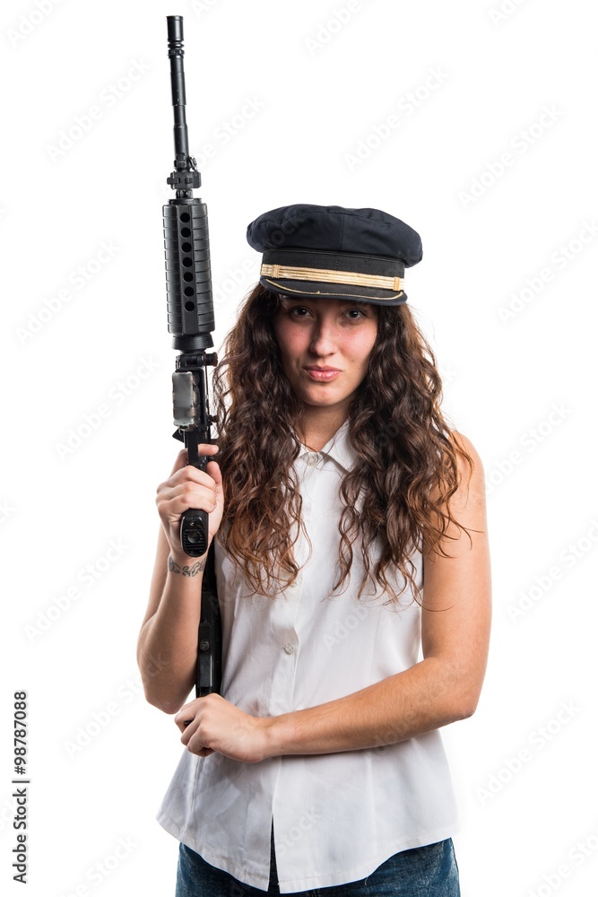Teen model wearing sea hat holding a rifle Teen model wearing sea hat holding a rifle