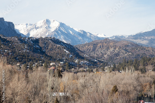 Mountain peak over Durango  Colorado and bare trees