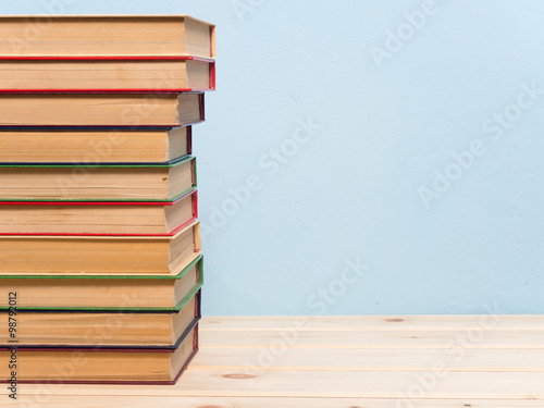 Books on a wooden shelf