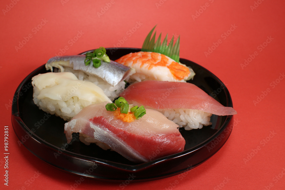 Japanese sushi plate close up in the celebration mood Japanese sushi plate close up in the celebration mood