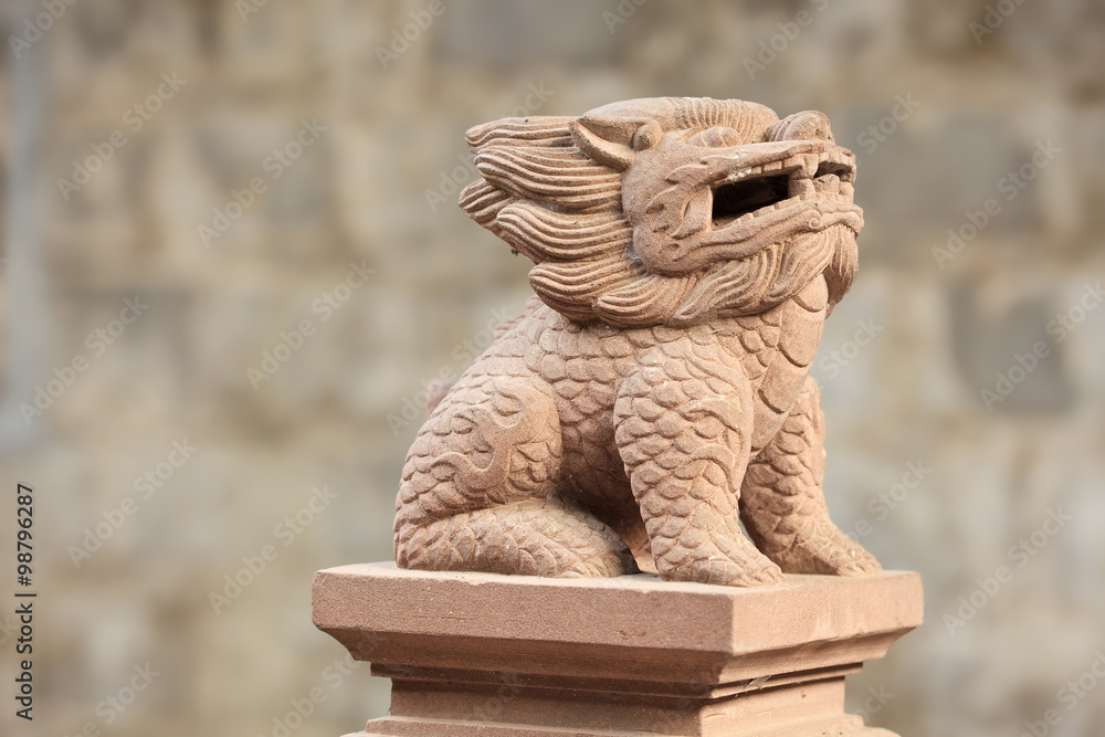 Guardian lion at an ancient Chinese residence