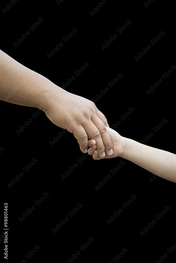 Shaking hands of man and children, isolated on black.