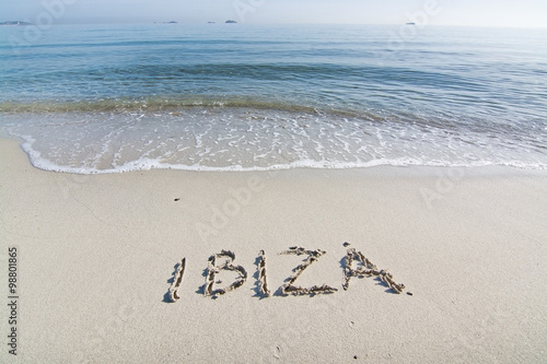 Ibiza written in sand