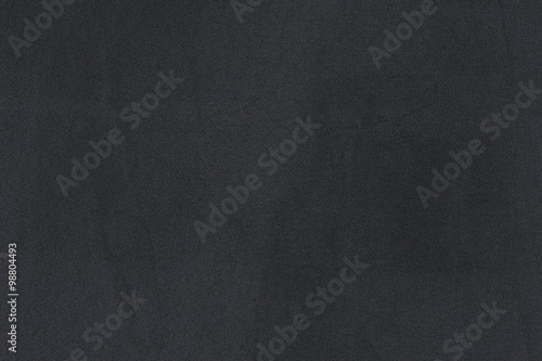 Grey textured wall, dark edges