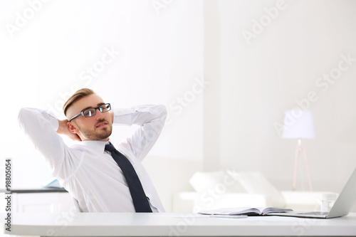 Businessman working with la...
