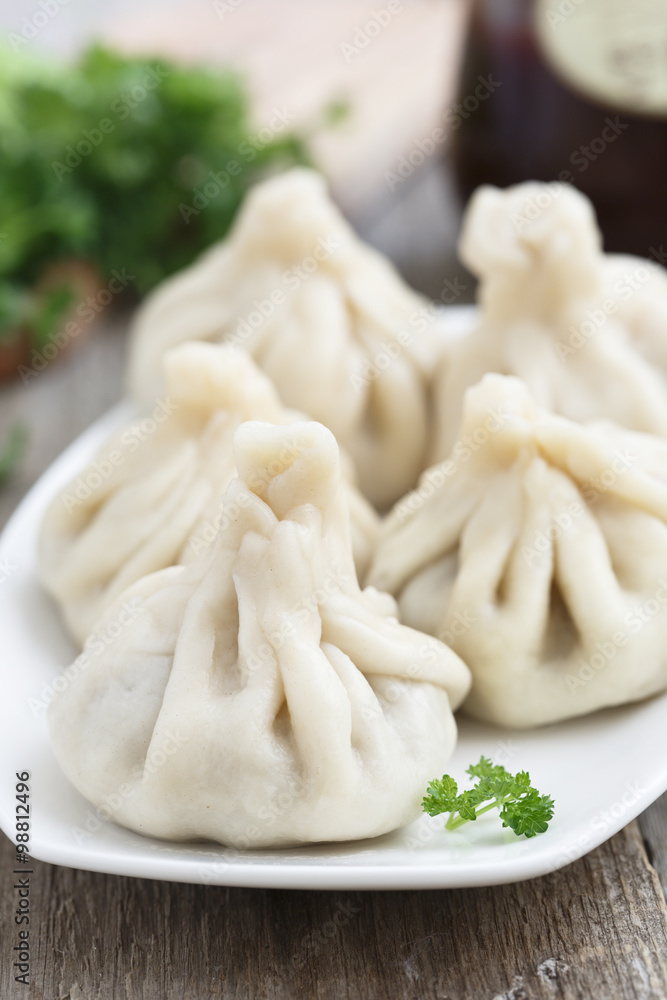 Traditional Georgian khinkali or dumplings, stuffed with meat Traditional Georgian khinkali or dumplings, stuffed with meat