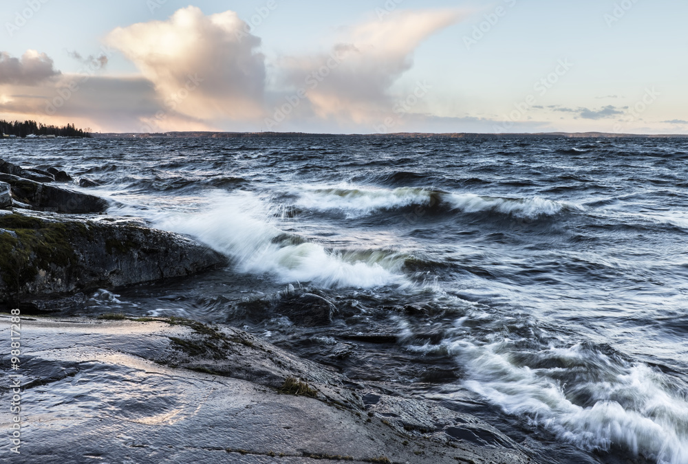 Stormy day next to lake in December in Finland