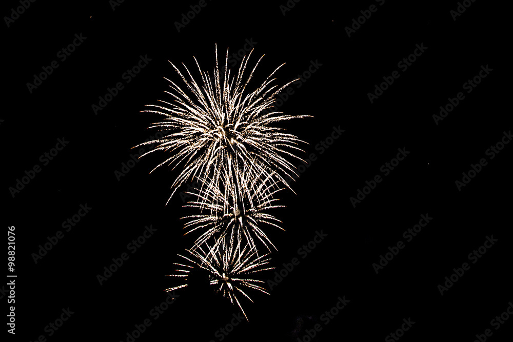 Three white fireworks, rockets in the sky Three white fireworks, rockets in the sky