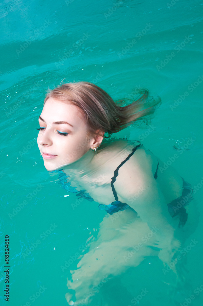 Young woman relaxing in the water
