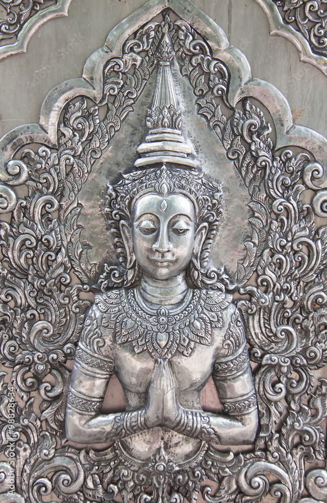 Thai style silver carving art on temple wall