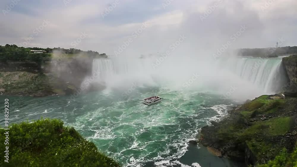 Niagara Falls - A Boat Approaches the Canadian Falls aka Horseshoe Falls. View from the Canadian Side. Niagara Falls - A Boat Approaches the Canadian Falls aka Horseshoe Falls. View from the Canadian Side.