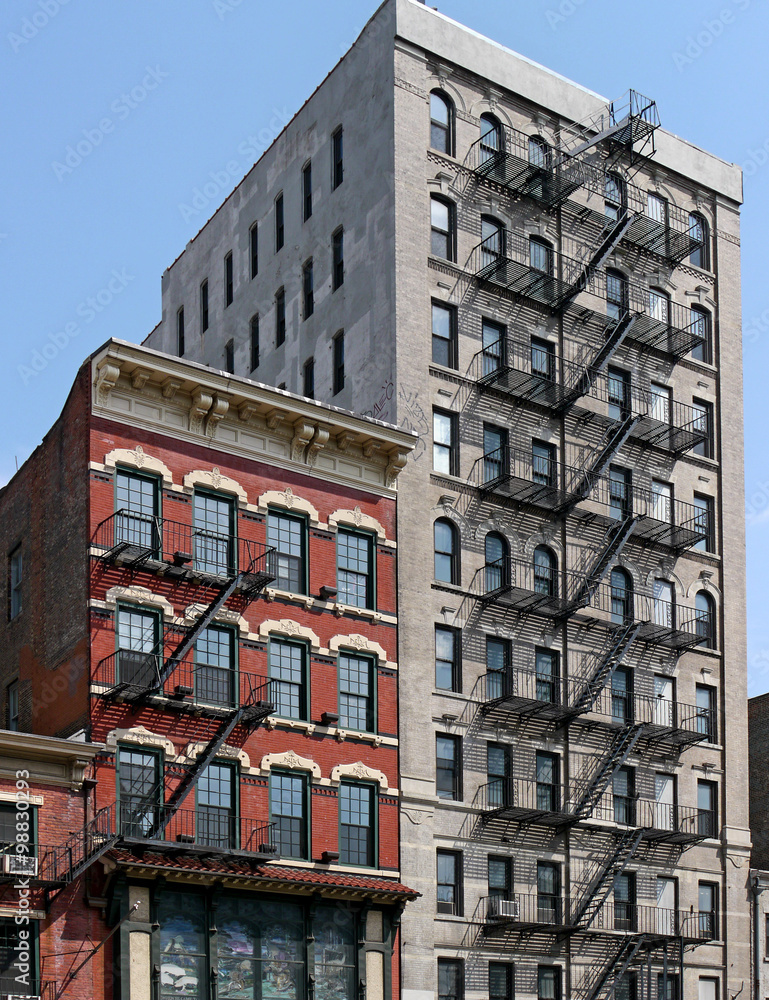 Fototapeta premium Manhattan, older buildings with external steel fire escape