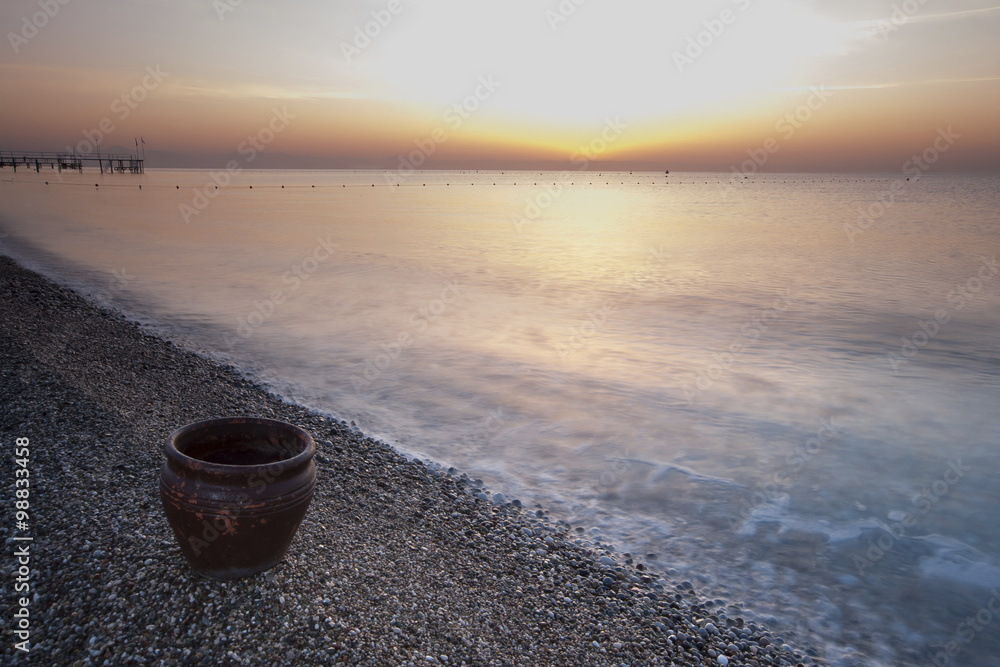 the clay pot on the coast, the sea and the beautiful sky the clay pot on the coast, the sea and the beautiful sky