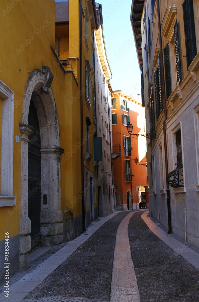 Old and narrow street in Verona. Italy