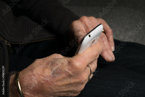 Grandma checking her smartphone