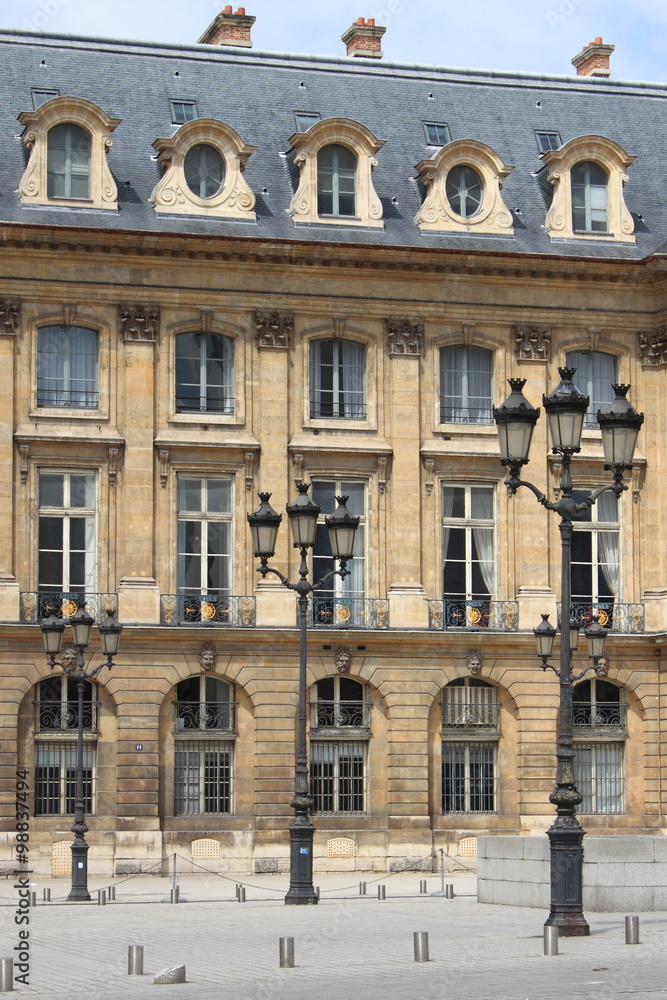 Renaissance building with street lamps in Paris, France